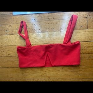 Tight red (under boob optional) top.